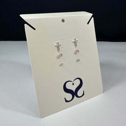 Aretes cruz rosados